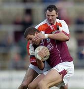 8 February 2004; Kevin walsh, Galway, in action against Armagh's Steven McDonnell. Allianz National Football League, Division 1B, Galway v Armagh, Pearse Stadium, Galway. Picture credit; Ray McManus / SPORTSFILE *EDI*