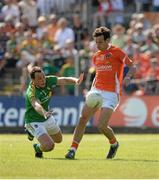 13 July 2013; Jamie Clarke, Armagh, in action against Brendan Brennan,  Leitrim. GAA Football All-Ireland Senior Championship, Round 2, Leitrim v Armagh, Pairc Sean Mac Diarmada, Carrick-on-Shannon, Co. Leitrim. Picture credit: Oliver McVeigh / SPORTSFILE