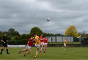 15 May 2021; Ryan Murray of Antrim kicks the match winning point under pressure from Sam Mulroy of Louth during the Allianz Football League Division 4 North Round 1 match between Louth and Antrim at Geraldines Club in Haggardstown, Louth. Photo by Ramsey Cardy/Sportsfile