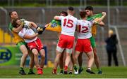 15 May 2021; Donegal players, from left, Neil McGee, Peadar Mogan and Brendan McCole tussle with Tyrone players, from left, Michael O'Neill, Richard Donnelly and Conor Meyler during the Allianz Football League Division 1 North Round 1 match between Tyrone and Donegal at Healy Park in Omagh, Tyrone. Photo by Stephen McCarthy/Sportsfile