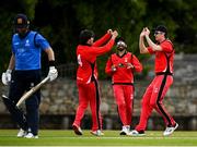 22 May 2021; Jack Carty, left, and Tyrone Kane of Munster Reds celebrate the wicket of Andy Balbirnie of Leinster Lighting during the Cricket Ireland InterProvincial Cup 2021 match between Munster Reds and Leinster Lightning at Pembroke Cricket Club in Dublin. Photo by Harry Murphy/Sportsfile