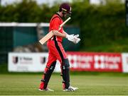 22 May 2021; Jack Carty of Munster Reds walks after being bowled out during the Cricket Ireland InterProvincial Cup 2021 match between Munster Reds and Leinster Lightning at Pembroke Cricket Club in Dublin. Photo by Harry Murphy/Sportsfile