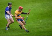 23 May 2021; John Conlon of Clare is tackled by PJ Scully of Laois during the Allianz Hurling League Division 1 Group B Round 3 match between Laois and Clare at MW Hire O'Moore Park in Portlaoise, Laois. Photo by Piaras Ó Mídheach/Sportsfile