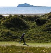 27 May 2021; Tom McKibbin of Northern Ireland walks to the 9th green during day one of the Irish Challenge Golf at Portmarnock Golf Links in Dublin. Photo by Ramsey Cardy/Sportsfile