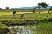 27 May 2021; Jonathan Yates of Ireland plays his second shot on the 5th hole during day one of the Irish Challenge Golf at Portmarnock Golf Links in Dublin. Photo by Ramsey Cardy/Sportsfile