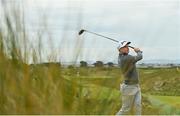 27 May 2021; Conor Purcell of Ireland watches his tee shot on the 16th hole during day one of the Irish Challenge Golf at Portmarnock Golf Links in Dublin. Photo by Ramsey Cardy/Sportsfile