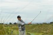 27 May 2021; Scott Henry of Scotland watches his tee shot on the 16th hole during day one of the Irish Challenge Golf at Portmarnock Golf Links in Dublin. Photo by Ramsey Cardy/Sportsfile