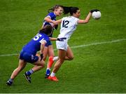 23 May 2021; Grace Clifford of Kildare in action against Fiona Dooley, behind, and Aoife Kirrane of Laois during the Lidl Ladies Football National League Division 3B Round 1 match between Laois and Kildare at MW Hire O'Moore Park in Portlaoise, Laois. Photo by Piaras Ó Mídheach/Sportsfile