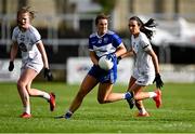 23 May 2021; Anna Healy of Laois in action against Aoife Rattigan, left, and Grace Clifford of Kildare during the Lidl Ladies Football National League Division 3B Round 1 match between Laois and Kildare at MW Hire O'Moore Park in Portlaoise, Laois. Photo by Piaras Ó Mídheach/Sportsfile