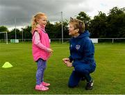 5 June 2021; 5-year-old Holly Boylan speaks with Republic of Ireland manager Vera Pauw during a visit from the Republic of Ireland women's team to St Mochta's FC in Clonsilla, Dublin. Photo by Matt Browne/Sportsfile