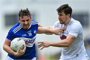 30 May 2021; Gary Walsh of Laois is tackled by Mark Dempsey of Kildare during the Allianz Football League Division 2 South Round 3 match between Laois and Kildare at MW Hire O'Moore Park in Portlaoise, Laois. Photo by Piaras Ó Mídheach/Sportsfile