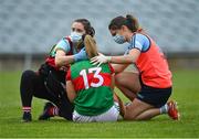 12 June 2021; Mayo team physio Rachel Tierney, left, and Dublin team doctor Noëlle Healy treat Maria Reilly of Mayo for an injury during the Lidl Ladies National Football League Division 1 semi-final match between Dublin and Mayo at LIT Gaelic Grounds in Limerick. Photo by Piaras Ó Mídheach/Sportsfile