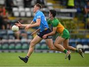 12 June 2021; Peadar Ó Cofaigh Byrne of Dublin in action against Ethan O'Donnell of Donegal during the Allianz Football League Division 1 semi-final match between Donegal and Dublin at Kingspan Breffni Park in Cavan. Photo by Stephen McCarthy/Sportsfile