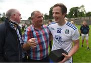 13 June 2021; Jack McCarron of Monaghan is congratulated by suspended Monaghan manager Seamus McEnaney, who was at the game as a spectator, after the Allianz Football League Division 1 Relegation play-off match between Monaghan and Galway at St. Tiernach’s Park in Clones, Monaghan. Photo by Philip Fitzpatrick/Sportsfile