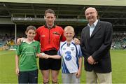 14 July 2013; William Fitzgerald, 10 years old, from Limerick, and Joe Booth, 9 years old, from Waterford, are pictured at the Electric Ireland Munster GAA Minor Hurling Championship Final, where they were the official ball-carriers and had the honour of presenting the match sliotar to referee Fergal Horgan before the game. William and Joe won their prizes through Electric Ireland’s Facebook page www.facebook.com/ElectricIreland. Electric Ireland Munster GAA Hurling Minor Championship Final, Waterford v Limerick, Gaelic Grounds, Limerick. Picture credit: Diarmuid Greene / SPORTSFILE