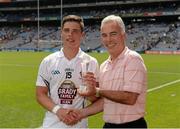 14 July 2013; Chris Healy, Kildare, is presented with the Electric Ireland Man of the Match Award by Sean Walsh, Electric Ireland. Electric Ireland Leinster GAA Football Minor Championship Final, Kildare v Westmeath, Croke Park, Dublin. Picture credit: Matt Browne / SPORTSFILE