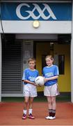 14 July 2013; Rachel Dardy, from Westmeath, and Kyle Downey, from Kildare, are pictured at the Electric Ireland Leinster GAA Minor Football  Championship Final, where they were the official ball-carriers and had the honour of presenting the match ball to the referee before the game. Rachel and Kyle won their prizes through Electric Ireland’s Facebook page www.facebook.com/ElectricIreland. Electric Ireland Leinster GAA Football Minor Championship Final, Kildare v Westmeath, Croke Park, Dublin. Picture credit: Barry Cregg / SPORTSFILE