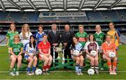 15 July 2013; Pictured at the launch are Pol O Gallchoir, Ceannsaí TG4, and Pat Quill, President of the Ladies Football Association, with players, from left to right, Deirdre Foley, Donegal, Eileen Rahill, Meath, Maria Moolick, Kildare, Therese McNally, Monaghan, Maggie Murphy, Laois, Ann Marie Walsh, Cork, Sinead Goldrick, Dublin, Fiona McHale, Mayo, Trina Durkan, Westmeath, Bernie Breen, Kerry, Mags McAlinden, Armagh, and Emer Gonsidine, Clare. September 29th will be the 40th time that the final of the Senior Ladies Gaelic Football Final will be contested. The first final took place in October 1974 and was contested by Tipperary and Offaly in a game that was won by the Tipperary women. The most successful team in the history of the game are Kerry who have won the title on 11 occasions including an unprecedented 9-in-a-row. In recent years Cork have been the dominant force winning 7 of the last 8 titles. TG4 made the announcement that RefCam will be introduced to Irish Sport for the first time. The lightweight head mounted device will be a feature of TG4’s live coverage of the 2013 Ladies Football Championship and will provide viewers with unique insight into the game but it will also be a hugely valuable coaching resource for referees. 2013 TG4 All-Ireland Ladies Football Championship Launch, Croke Park, Dublin. Picture credit: David Maher / SPORTSFILE