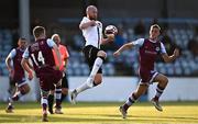 21 June 2021; Chris Shields of Dundalk in action against Mark Doyle, left, and Killian Phillips of Drogheda United during the SSE Airtricity League Premier Division match between Drogheda United and Dundalk at Head in the Game Park in Drogheda, Louth. Photo by Piaras Ó Mídheach/Sportsfile