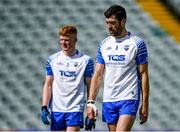 26 June 2021; Waterford players Tommy Prendergast, right, and Seán Boyce after their side's defeat in the Munster GAA Football Senior Championship Quarter-Final match between Limerick and Waterford at LIT Gaelic Grounds in Limerick. Photo by Piaras Ó Mídheach/Sportsfile