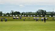 27 June 2021; Spectators watch the action from their cars during the Cricket Ireland InterProvincial Trophy 2021 match between North West Warriors and Leinster Lightning at Bready Cricket Club in Magheramason, Tyrone. Photo by Harry Murphy/Sportsfile