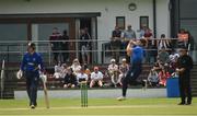 27 June 2021; Spectators look on from the clubhouse during the Cricket Ireland InterProvincial Trophy 2021 match between North West Warriors and Leinster Lightning at Bready Cricket Club in Magheramason, Tyrone. Photo by Harry Murphy/Sportsfile