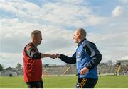 27 June 2021; Carlow manager Niall Carew with Longford manager Padraic Davis after the Leinster GAA Football Senior Championship Round 1 match between Carlow and Longford at Bord Na Mona O’Connor Park in Tullamore, Offaly. Photo by Eóin Noonan/Sportsfile