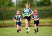 28 June 2021; Kilkenny camogie star, Grace Walsh was on hand with Grainne O'Brien, age 10, left, and Rachel McAuliffe, age 10, in Bruff GAA Club, Limerick to mark the first day of this year’s Kellogg’s GAA Cúl Camps with numbers of over 130,000 expected to attend across 1,242 camps the length and breadth of the country. The 2021 Kellogg’s GAA Cúl Camps offers children a healthy, fun and safe summer outdoor activity at locations nationwide, and will continue until the end of August. Photo by Stephen McCarthy/Sportsfile