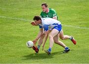 26 June 2021; Michael Curry of Waterford in action against Darragh Treacy of Limerick during the Munster GAA Football Senior Championship Quarter-Final match between Limerick and Waterford at LIT Gaelic Grounds in Limerick. Photo by Piaras Ó Mídheach/Sportsfile