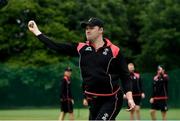 30 June 2021; Josh Manley of Miunster Reds warms up prior to the Cricket Ireland InterProvincial Cup 2021 match between Northern Knights and Munster Reds at Bready Cricket Club in Stormont in Belfast. Photo by David Fitzgerald/Sportsfile