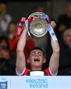 2 July 2021; Derry captain Matthew Downey lifts the cup after the Electric Ireland Ulster GAA Football Minor Championship Final 2020  match between Monaghan and Derry at Healy Park in Omagh, Tyrone. Photo by Piaras Ó Mídheach/Sportsfile