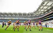 3 July 2021; Wexford players warm-up before the Leinster GAA Hurling Senior Championship Semi-Final match between Kilkenny and Wexford at Croke Park in Dublin. Photo by Seb Daly/Sportsfile
