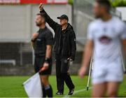 4 July 2021; Offaly manager John Maughan signals to referee Martin McNally before Jimmy Hyland of Kildare was shown a black card during the Leinster GAA Football Senior Championship Quarter-Final match between Kildare and Offaly at MW Hire O'Moore Park in Portlaoise, Laois. Photo by Piaras Ó Mídheach/Sportsfile