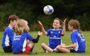 6 July 2021; Sarah Carty, centre, age 7, with, from left, Malachy Reynolds, age 8, Conan O'Grady, age 8, and Iris Roulston, age 8, during a Bank of Ireland Leinster Rugby Summer Camp at Wexford Wanderers RFC in Wexford. Photo by Matt Browne/Sportsfile