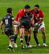 7 July 2021; Louis Rees-Zammit, left, and Bundee Aki of British and Irish Lions combine to tackle Manie Libbok of Cell C Sharks during the 2021 British and Irish Lions tour match between Cell C Sharks and The British and Irish Lions at Emirates Airline Park in Johannesburg, South Africa. Photo by Sydney Seshibedi/Sportsfile