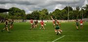 10 July 2021; Eimear Scally of Cork kicks goalwards under pressure from Shauna Ennis of Meath during the TG4 All-Ireland Senior Ladies Football Championship Group 2 Round 1 match between Cork and Meath at St Brendan's Park in Birr, Offaly. Photo by Ray McManus/Sportsfile