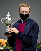 18 July 2021; Jockey Billy Lee celebrates with the cup after winning the Kilboy Estate Stakes on Insinuendo at The Curragh Racecourse in Kildare. Photo by David Fitzgerald/Sportsfile