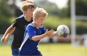 23 July 2021; Jack Moore, age 10, in action during the Bank of Ireland Leinster Rugby Summer Camp at Portlaoise RFC in Portlaoise, Laois. Photo by Matt Browne/Sportsfile