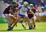 24 July 2021; Dessie Hutchinson of Waterford is tackled by Adrian Tuohey, left, and Jack Fitzpatrick of Galway during the GAA Hurling All-Ireland Senior Championship Round 2 match between Waterford and Galway at Semple Stadium in Thurles, Tipperary. Photo by Ray McManus/Sportsfile