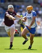 24 July 2021; Billy Power of Waterford is tackled by Shane Cooney of Galway during the GAA Hurling All-Ireland Senior Championship Round 2 match between Waterford and Galway at Semple Stadium in Thurles, Tipperary. Photo by Ray McManus/Sportsfile