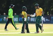 24 July 2021; Temba Bavuma, left, and Reeza Hendricks of South Africa fist bump during the Men's T20 International match between Ireland and South Africa at Stormont in Belfast. Photo by David Fitzgerald/Sportsfile