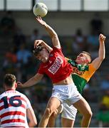 25 July 2021; Seán O’Shea of Kerry scores his side's third goal despite the efforts of Kevin O’Donovan of Cork during the Munster GAA Football Senior Championship Final match between Kerry and Cork at Fitzgerald Stadium in Killarney, Kerry. Photo by Eóin Noonan/Sportsfile