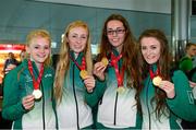 20 July 2013; Gold medal winners in the 4x100m Relay, from left, Laura Ann Costello, Galway City Harriers, Niamh McNicol, Stella Maris Tramore, Roseanna McGuckian, Ballymena AC, and Phoebe Murphy, Loreto Clonmel, on their arrival at Dublin airport following the European Youth Olympic Festival in Utrecht, Holland. European Youth Olympics Team Return, Dublin Airport, Dublin. Picture credit: Ray McManus / SPORTSFILE