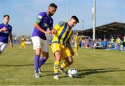 24 July 2021; Eoin Duff of Fairview Rangers in action against David Webster of Finn Harps during the FAI Cup First Round match between Fairview Rangers and Finn Harps at Fairview Rangers AFC in Limerick. Photo by Michael P Ryan/Sportsfile