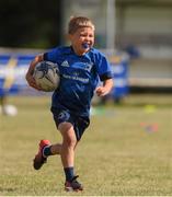 28 July 2021; Oisin Egan, age 6, in action during the Bank of Ireland Leinster Rugby Summer Camp at Kilkenny RFC in Kilkenny. Photo by Matt Browne/Sportsfile