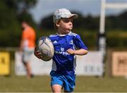 28 July 2021; Liam Grogan, age 6, in action during the Bank of Ireland Leinster Rugby Summer Camp at Kilkenny RFC in Kilkenny. Photo by Matt Browne/Sportsfile