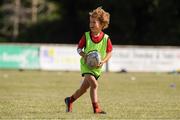 28 July 2021; Hugo McGlynn, age 6, in action during the Bank of Ireland Leinster Rugby Summer Camp at Kilkenny RFC in Kilkenny. Photo by Matt Browne/Sportsfile