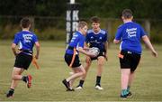 28 July 2021; Owen Walsh, age 11, in action during the Bank of Ireland Leinster Rugby Summer Camp at Kilkenny RFC in Kilkenny. Photo by Matt Browne/Sportsfile