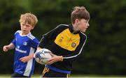 29 July 2021; Ruairi Dowling, age 9, in action during the Bank of Ireland Leinster Rugby Summer Camp at Westmanstown RFC in Dublin. Photo by Matt Browne/Sportsfile