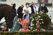 29 July 2021; Racegoers Jennifer, left, and Eimear McCabe, from Longford, watch as horses are paraded on day four of the Galway Races Summer Festival at Ballybrit Racecourse in Galway. Photo by David Fitzgerald/Sportsfile